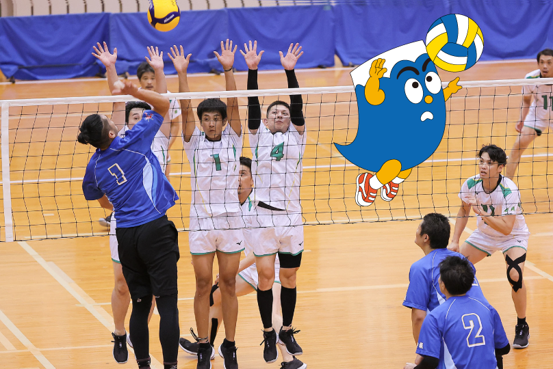 バレーボールの試合でスパイクを打つ選手